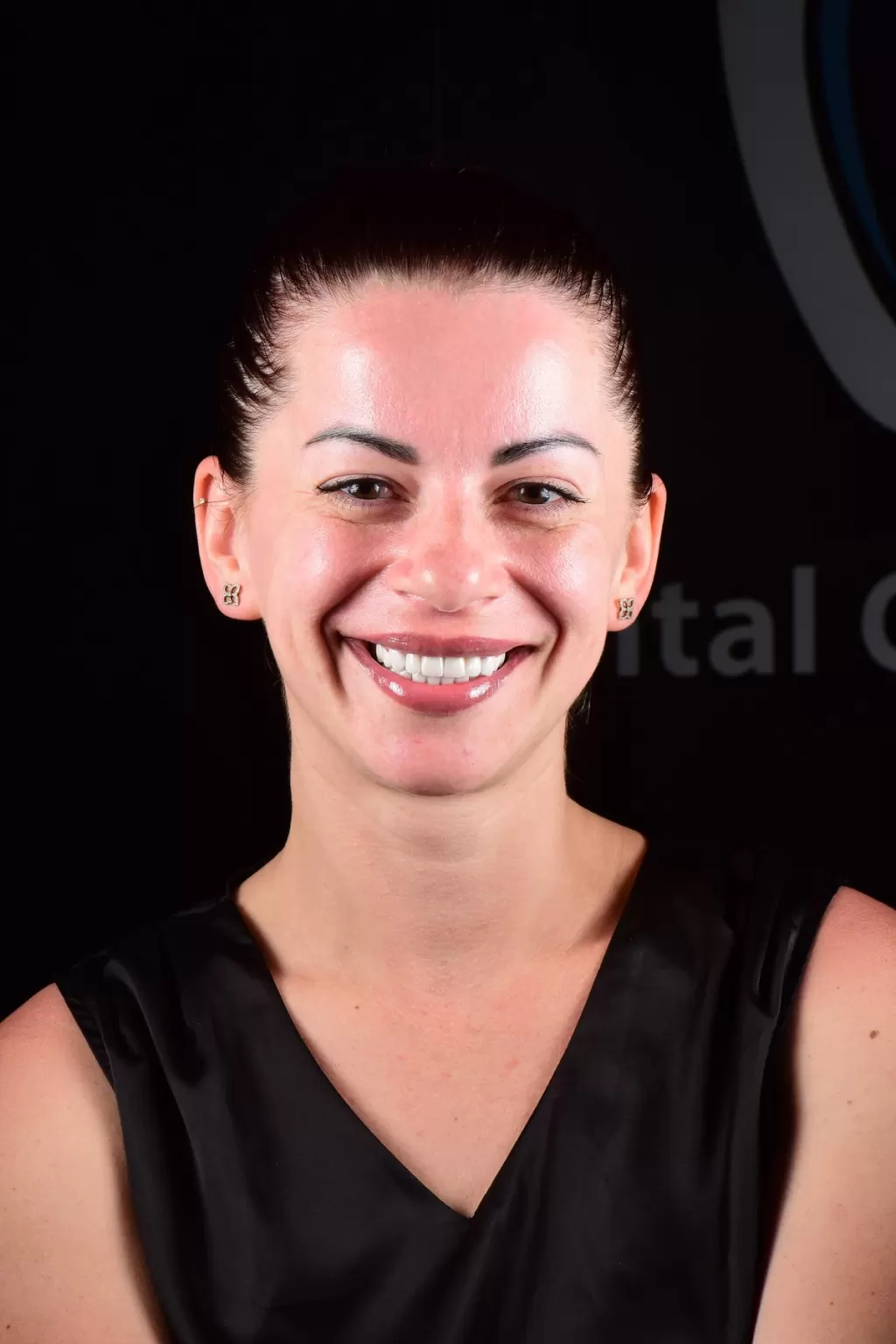 A patient's smile after treatment at the clinic