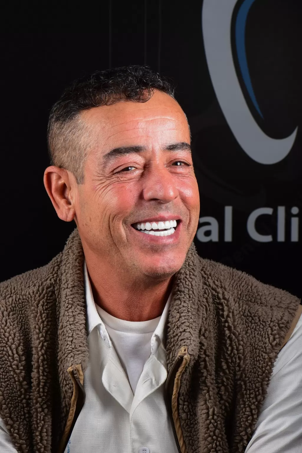 A patient's smile after treatment at the clinic